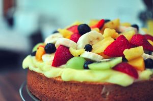 Couple the Broken Cake With Fruits