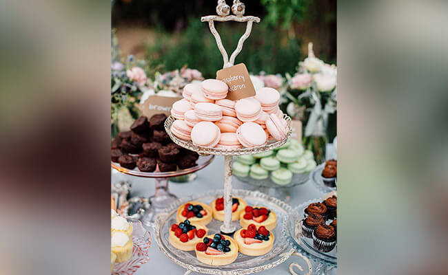 dessert buffet with a plain cake