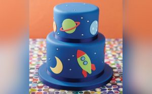 Space-Themed Deep Blue Fondant Cake With Edible Details