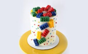 Vibrant Lego-Themed Fondant Cake