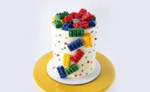 Vibrant Lego-Themed Fondant Cake